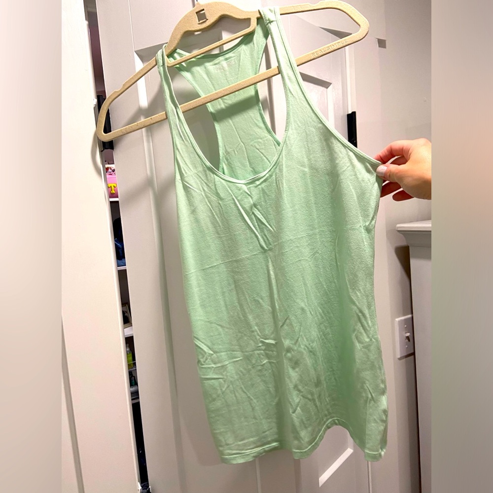 Mint green racer back tank. Express size small. Used - like new condition